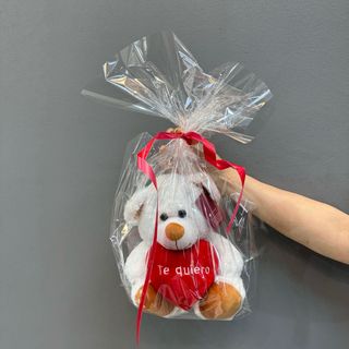 Peluche ( oso P. ) color lechoso 