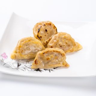 016. Ravioli di carne alla piastra