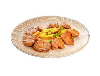 Вълчи хапки от свинско бон филе със сотирани зеленчуци (350г)