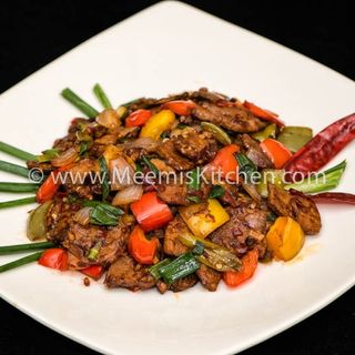 Dry Chilli Pork Served with fries 