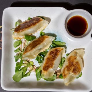 121.Ravioli di maiale alla piastra