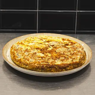 Tortilla De Trufa Con Queso Y Cebolla