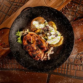 Pork neck steak with twice baked potatoes