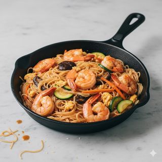 Spaghetti di soia con gamberoni in tegame