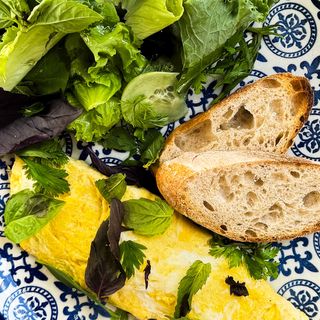 Omelet, fresh salad, toasted bread 