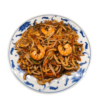 Spaghetti udon saltati con gamberi