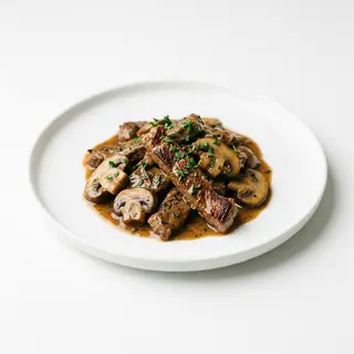 Ternera Con Champiñones