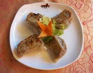 115 Ravioli alla griglia con vino cinese 4 pezzi