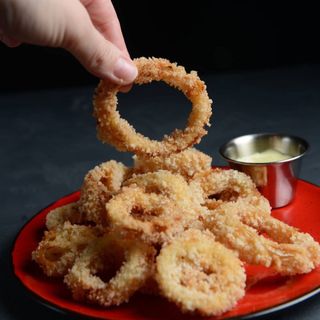 Цибулеві кільця з Часниковим соусом (200г)