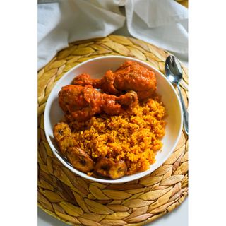 Rice and stew with turkey and plantain