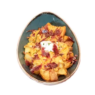 Patatas Bravas con virutas de jamón 100% ibérico