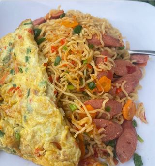 Our sausage noodles served with egg 