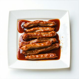 Auténticos Torreznos De Soria Acompañados De Barbacoa Bull'S Eye