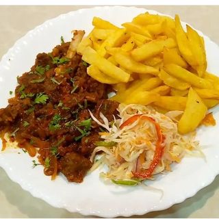 Mbuzi Wet Fry served with ugali/chapati/rice