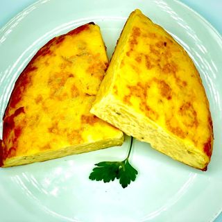 1/4 Tortilla de patatas y cebolla