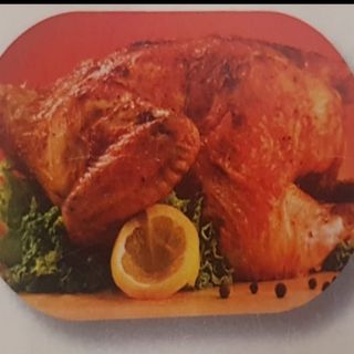 Medio pollo asado con patata 