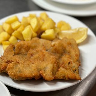 Milanesa de ternera con guarnición 