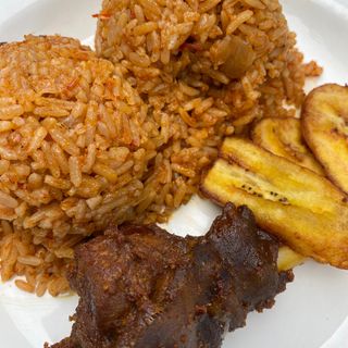 Smokey Jollof with Goat Meat & Plantain