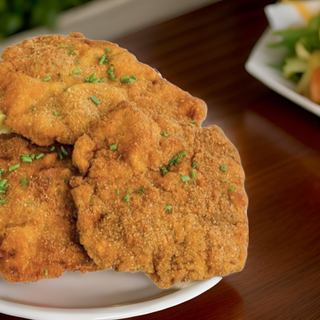 Meniu snitel de porc cu orez sarbesc