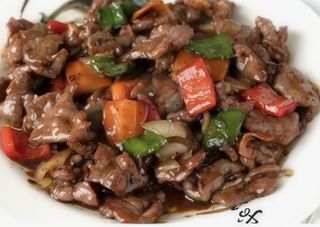 69 Ternera Con Salsa De Ostras