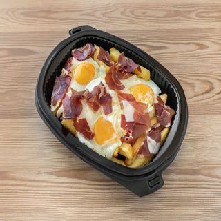 Huevos rotos con jamón