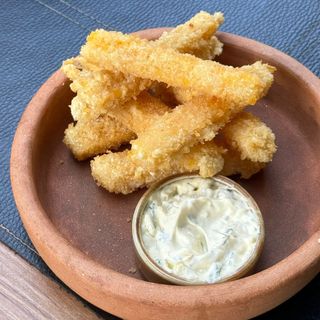 Cheese sticks in batter with garlic sauce