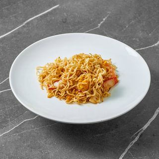 Spaghetti saltati con frutti di mare