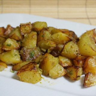Ración De Patatas Al Ajo