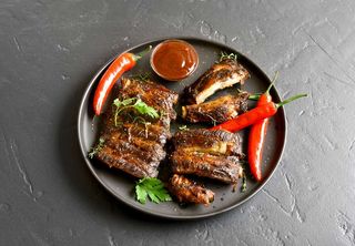 Ребра  на мангалі в медовій глазурі (100г)