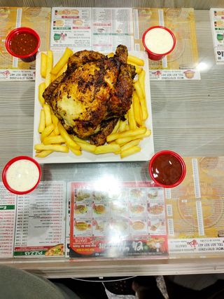 Pollo A L'Ast Entero Con Patatas