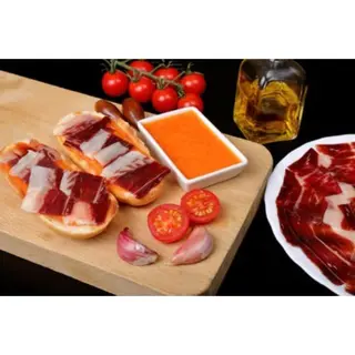 Tostas De Jamón Ibérico Y Tumaca