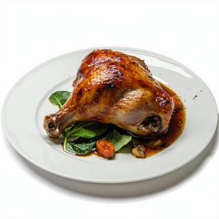 Muslo de pollo a la brasa con guarnición