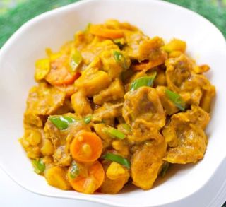 Plantain porridge with veggies and and Titus fish 