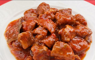 Carne Con Tomate-Ajillo (Ración)