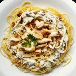 Spaguetti roquefort y pollo