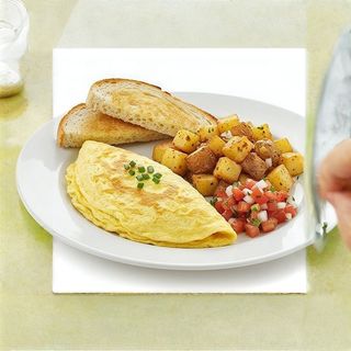 Omelette served with Toast Potato Hash & Salsa Plain