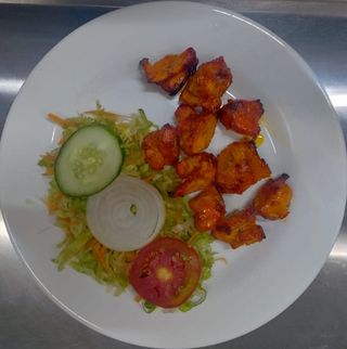 Boneless Chicken Tikka + Chips OR Naan