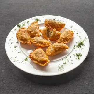 Pierogi z kapustą i grzybami zapiekane
