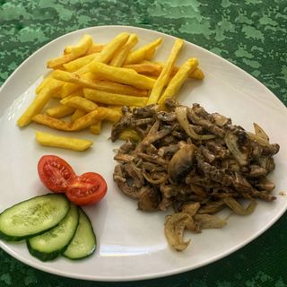 Говядина с шампиньонами