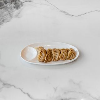 Ravioli di carne alla griglia 锅贴