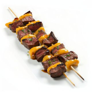 143. Pincho De Ternera Con Queso (2 Uds.)