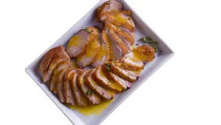 Pato con salsa naranja