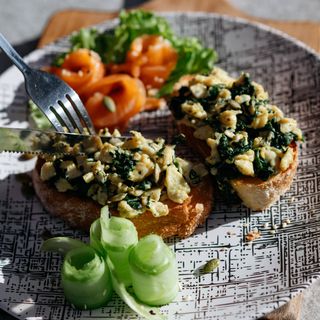 Scrambled eggs with spinach and salmon