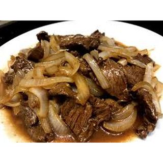 Beef With Onions Served With Rice