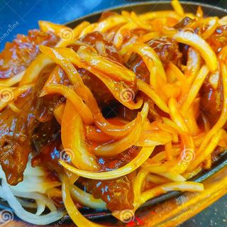 Ternera Con Cebollas