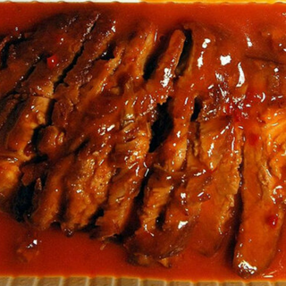 Cerdo con salsa de jengibre y picante