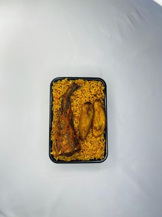 A Plate Of Rice With Fish