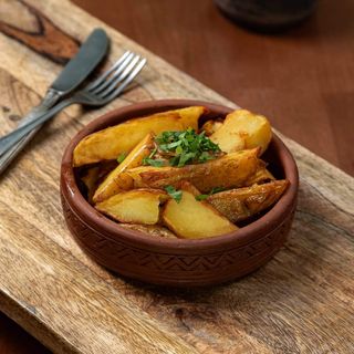 Zapiekane ziemniaki z cebulą 150g