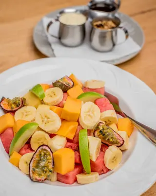 Seasonal Fruit Salad, Yogurt, Muesli, And Ugandan Honey