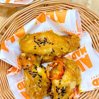 Alitas Maracumango picante 